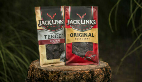 A tree stump carrying Original and Original extra tender jerky.