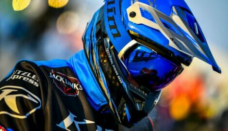 Zoomed-in shot of Emil Harr with his helmet on, bracing himself for the race to come.